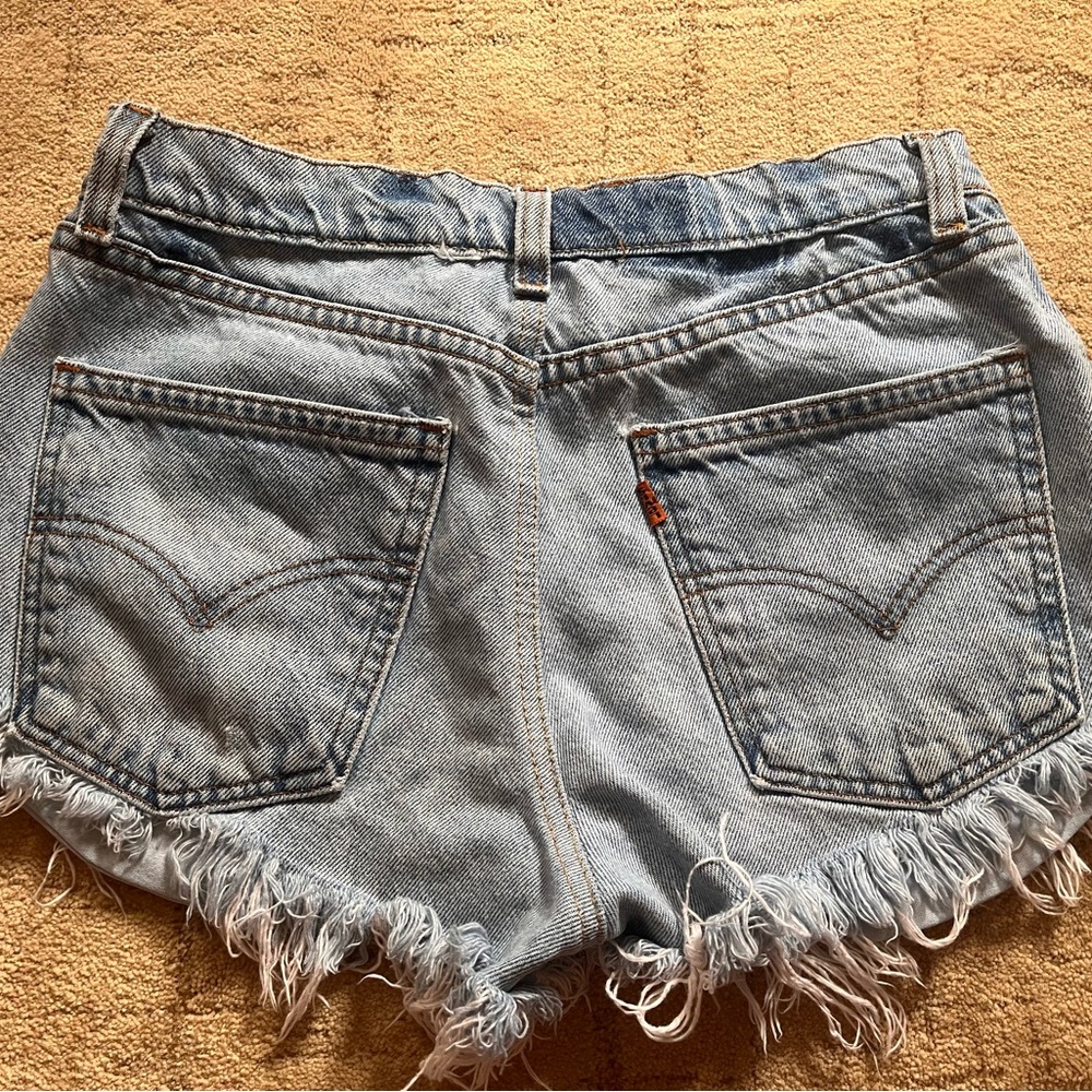 Orange Tag Levi’s size 26 waist distressed shorts